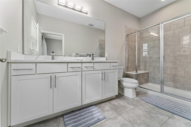 11162 Hanlon Terrace Aly, Winter Garden, FL 34787 - full bathroom with double vanity, tile patterned flooring, toilet, a shower stall, and visible vents