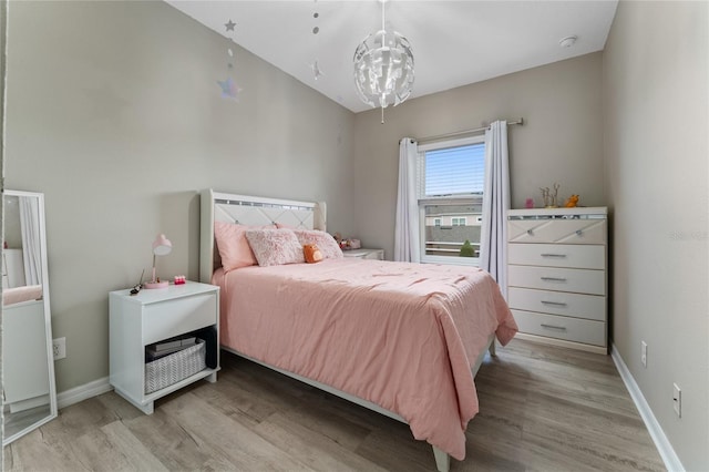 11162 Hanlon Terrace Aly, Winter Garden, FL 34787 - bedroom featuring baseboards and light wood-style floors