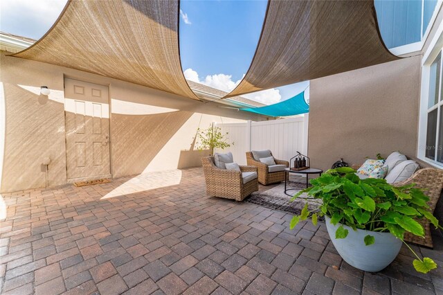 11162 Hanlon Terrace Aly, Winter Garden, FL 34787 - view of patio with fence and an outdoor hangout area