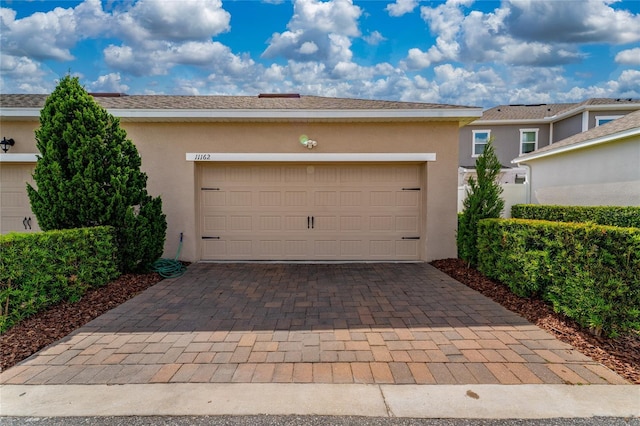 11162 Hanlon Terrace Aly, Winter Garden, FL 34787 - garage with decorative driveway