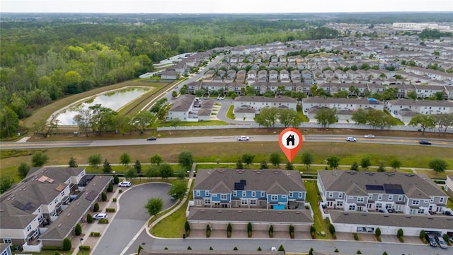 11162 Hanlon Terrace Aly, Winter Garden, FL 34787 - bird's eye view featuring a wooded view and a residential view