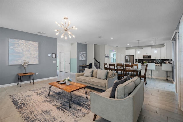 living room with baseboards, a chandelier, recessed lighting, light tile patterned floors, and visible vents
