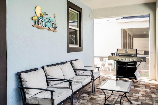 view of patio featuring a grill