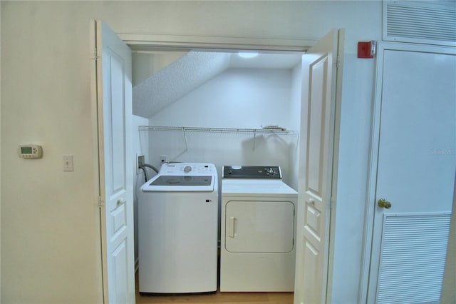 660 Celebration Ave Unit 240, Kissimmee, FL 34747 - laundry room with washer and dryer and laundry area