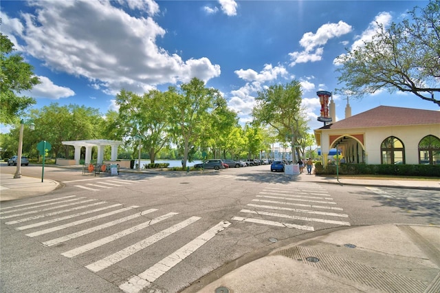 660 Celebration Ave Unit 240, Kissimmee, FL 34747 - view of street with curbs, sidewalks, and street lights