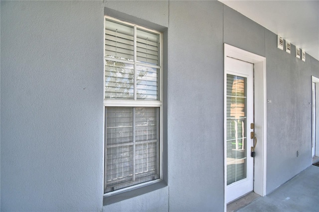 660 Celebration Ave Unit 240, Kissimmee, FL 34747 - view of exterior entry with stucco siding