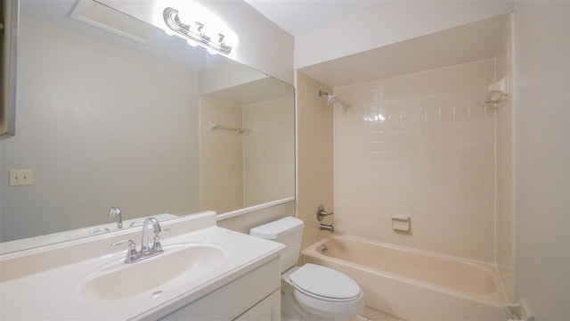 bathroom featuring vanity,  shower combination, and toilet