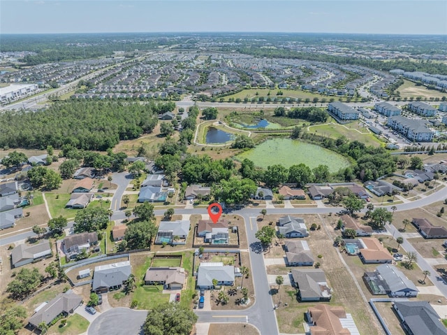 aerial view with a residential view and a water view