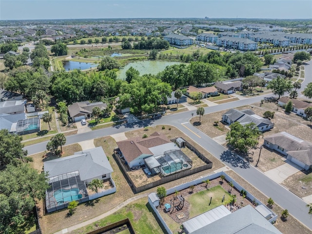 bird's eye view with a water view and a residential view
