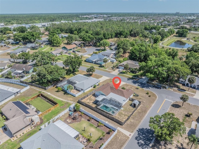 aerial view with a water view and a residential view