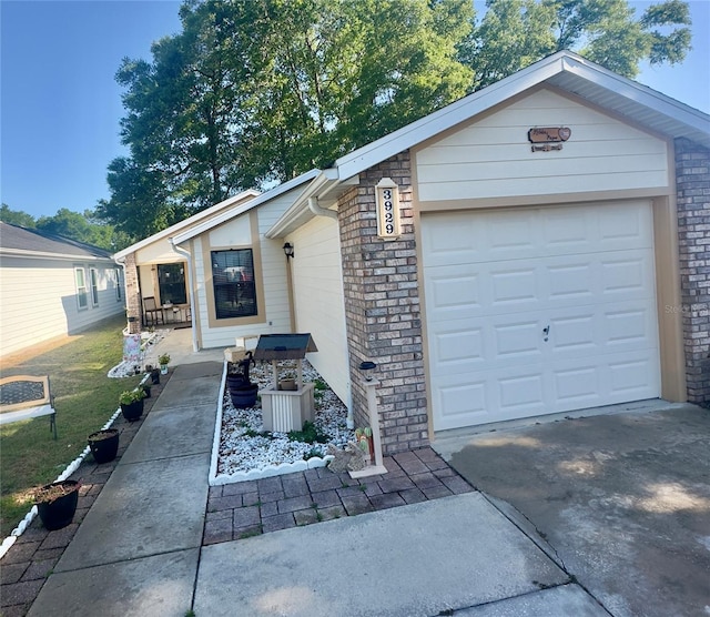 view of front of property with concrete driveway