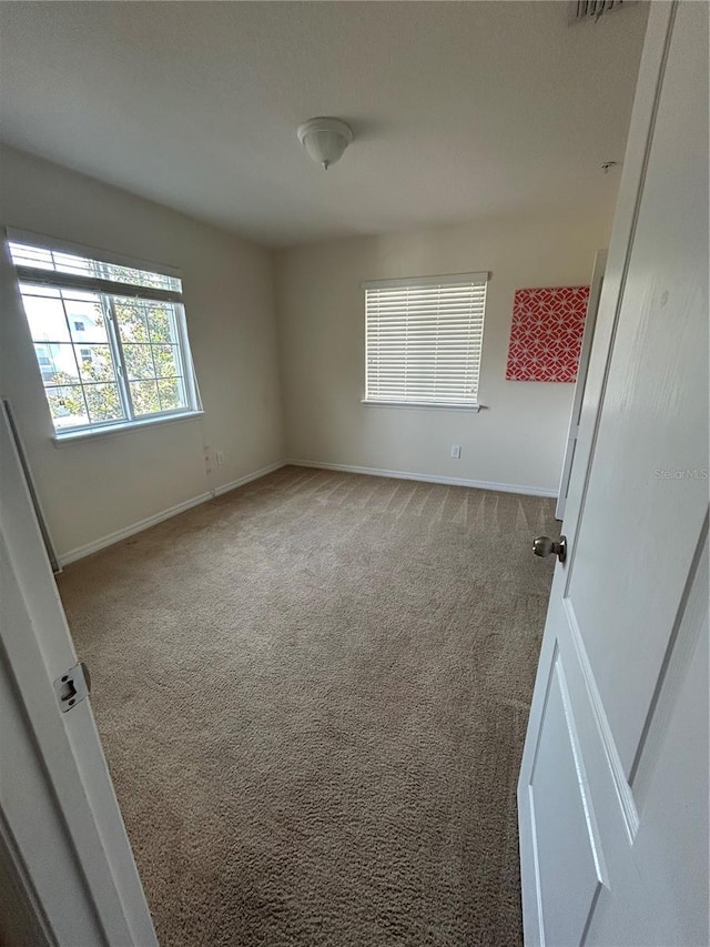 2305 Chatham Place Dr, Orlando, FL 32824 - unfurnished room featuring carpet and baseboards
