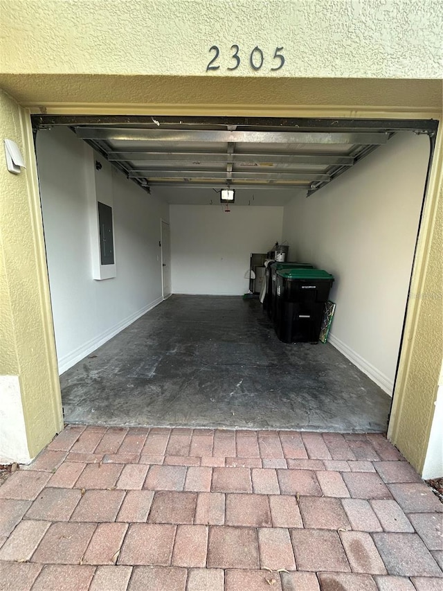 2305 Chatham Place Dr, Orlando, FL 32824 - garage featuring electric panel and a garage door opener