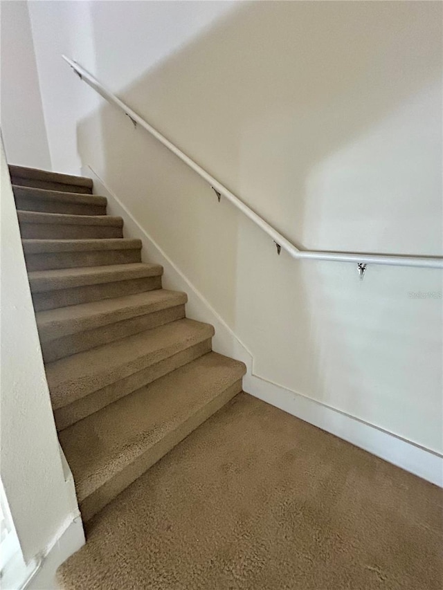 2305 Chatham Place Dr, Orlando, FL 32824 - stairs with carpet and baseboards