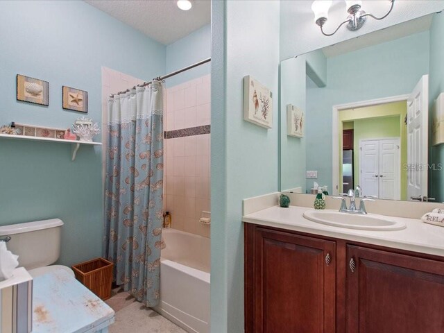 2724 Palm Tree Dr, Poinciana, FL 34759 - full bathroom featuring shower / bath combo with shower curtain, toilet, and vanity