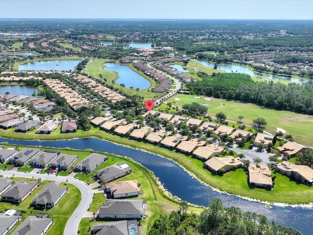 2724 Palm Tree Dr, Poinciana, FL 34759 - aerial view featuring golf course view, a water view, and a residential view