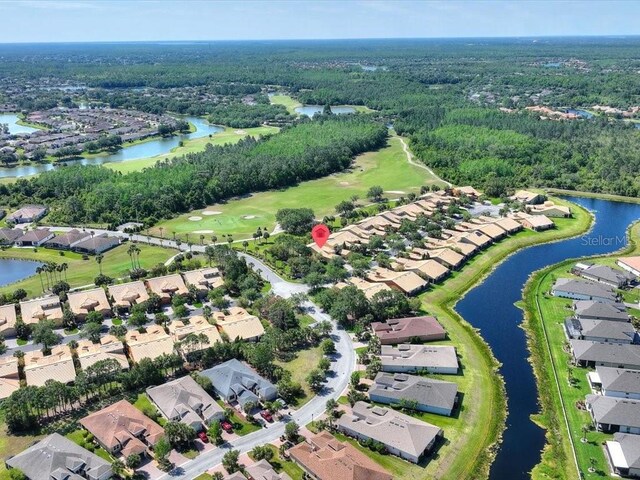 2724 Palm Tree Dr, Poinciana, FL 34759 - bird's eye view with a forest view, a residential view, and a water view