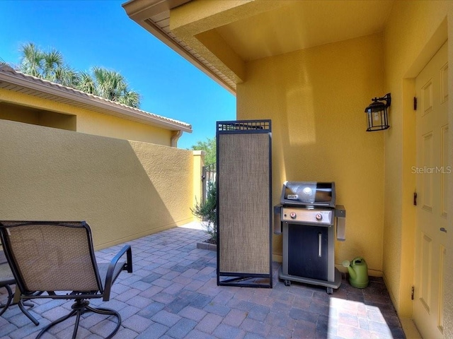 2724 Palm Tree Dr, Poinciana, FL 34759 - view of patio / terrace with grilling area