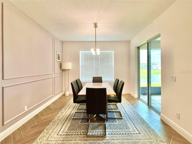 5019 Down Ct, Saint Cloud, FL 34772 - dining space with baseboards and a textured ceiling