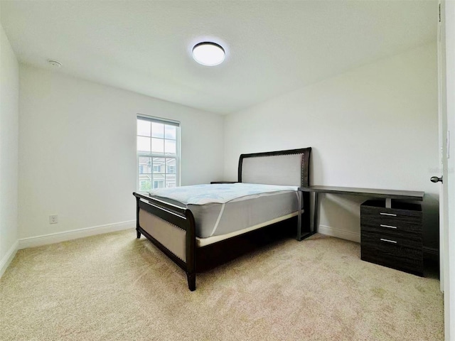5019 Down Ct, Saint Cloud, FL 34772 - bedroom with light carpet and baseboards