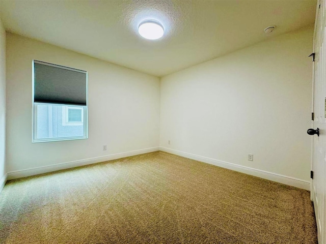 5019 Down Ct, Saint Cloud, FL 34772 - carpeted empty room with baseboards and a textured ceiling
