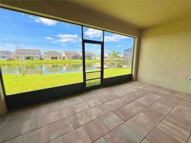 5019 Down Ct, Saint Cloud, FL 34772 - unfurnished sunroom with a water view and a residential view