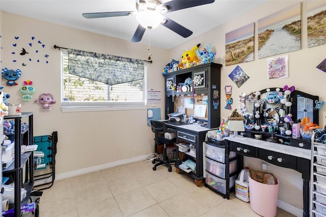 office space with tile patterned flooring, baseboards, and ceiling fan