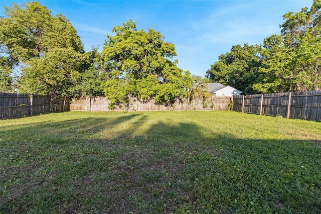 view of yard featuring a fenced backyard