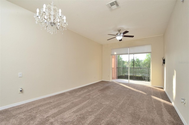 1357 Venezia Ct Unit 202, Davenport, FL 33896 - spare room featuring visible vents, baseboards, ceiling fan with notable chandelier, and carpet floors