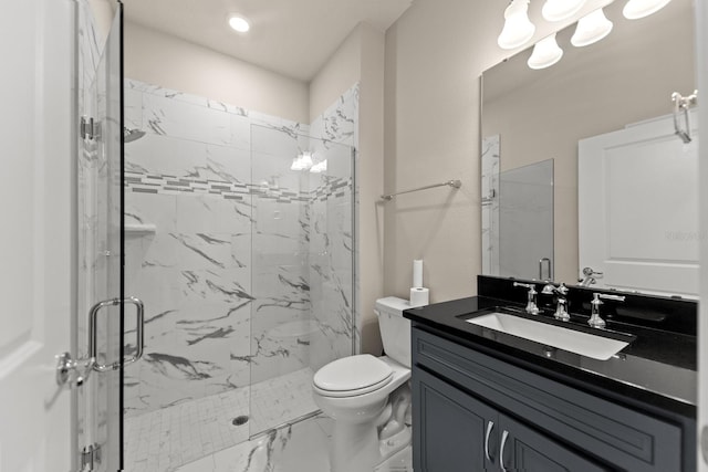2019 Spring Shower Cir, Kissimmee, FL 34744 - bathroom featuring a marble finish shower, vanity, and toilet