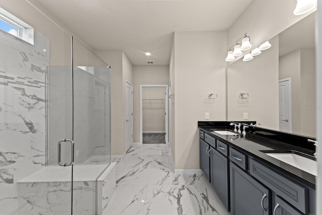 2019 Spring Shower Cir, Kissimmee, FL 34744 - full bath featuring a spacious closet, marble finish floor, a marble finish shower, a sink, and baseboards