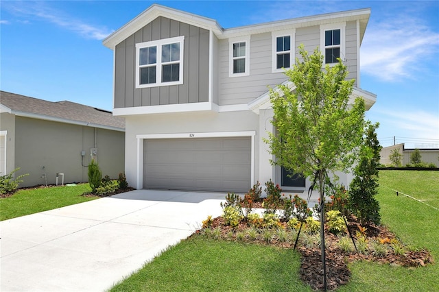 824 Lake Dell Rd, Dundee, FL 33838 - view of front facade with board and batten siding, a garage, a front yard, and driveway