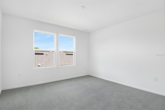824 Lake Dell Rd, Dundee, FL 33838 - empty room with baseboards and carpet