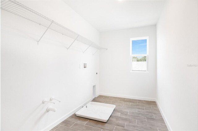 824 Lake Dell Rd, Dundee, FL 33838 - laundry area featuring hookup for a gas dryer, hookup for a washing machine, wood tiled floors, baseboards, and electric dryer hookup