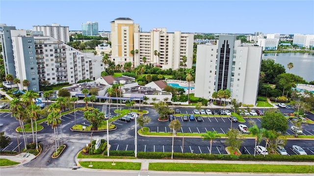 6165 Carrier Dr Unit 1603, Orlando, FL 32819 - view of property with uncovered parking and a city view