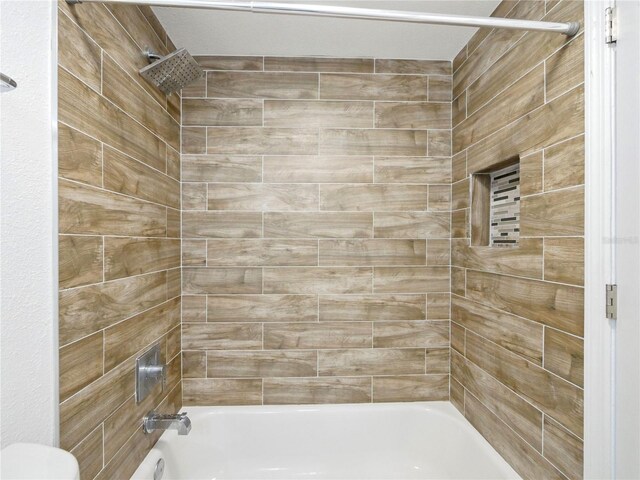 6165 Carrier Dr Unit 1603, Orlando, FL 32819 - bathroom featuring  shower combination and toilet