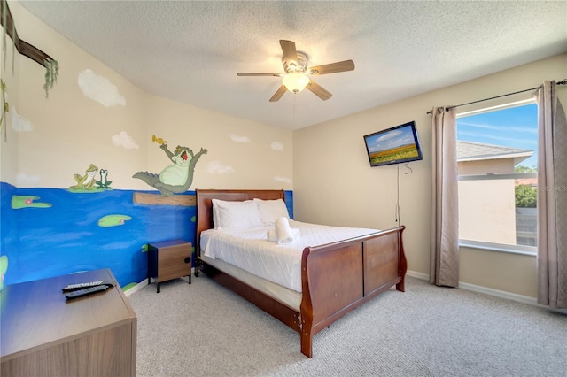 997 Lake Berkley Dr, Kissimmee, FL 34746 - bedroom with carpet floors, a textured ceiling, and baseboards