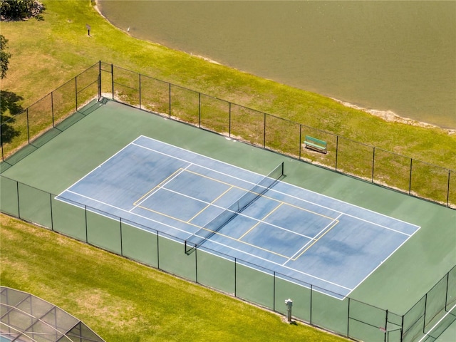 997 Lake Berkley Dr, Kissimmee, FL 34746 - view of sport court with fence and a yard