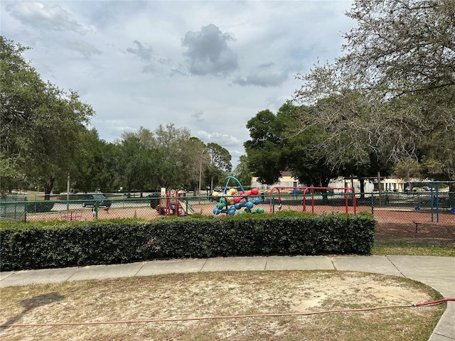 surrounding community with fence and playground community
