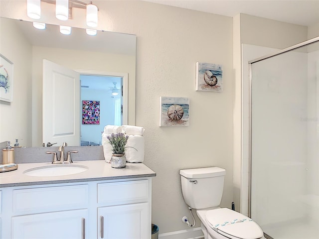 345 Ocean Course Ave, Davenport, FL 33896 - full bath with baseboards, vanity, toilet, and a stall shower