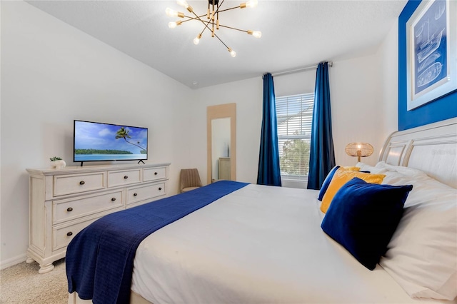 bedroom with a chandelier, baseboards, and light colored carpet