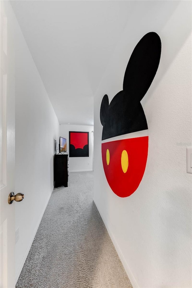 hallway with carpet