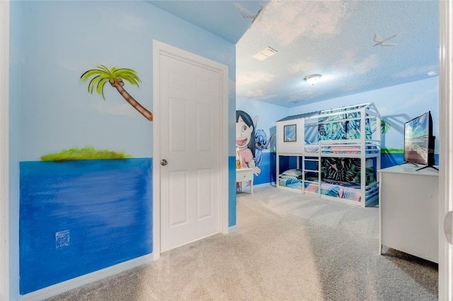 carpeted bedroom with visible vents and baseboards