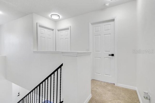 227 Sand Ridge Dr, Davenport, FL 33896 - walk in closet with light carpet