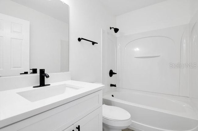 227 Sand Ridge Dr, Davenport, FL 33896 - full bathroom with toilet, shower / bathtub combination, and vanity