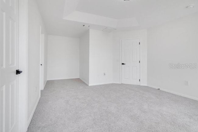 227 Sand Ridge Dr, Davenport, FL 33896 - carpeted empty room with baseboards