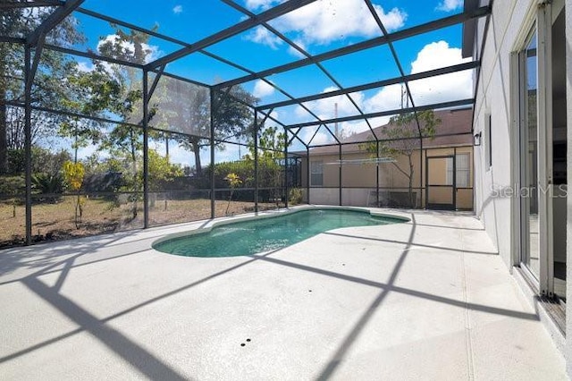227 Sand Ridge Dr, Davenport, FL 33896 - pool with glass enclosure and a patio