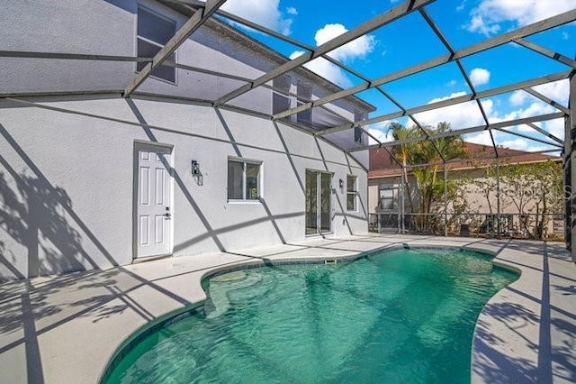 227 Sand Ridge Dr, Davenport, FL 33896 - pool with a lanai and a patio area