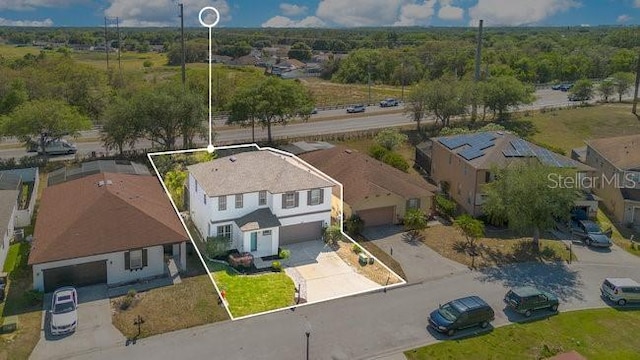 227 Sand Ridge Dr, Davenport, FL 33896 - aerial view with a residential view