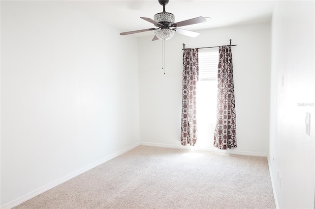 9016 Pyrus St, Kissimmee, FL 34747 - carpeted spare room featuring a ceiling fan and baseboards